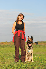Image showing malinois and woman