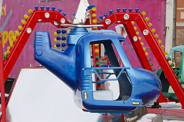 Image showing amusement park rides colorful carousel spin helicopter 