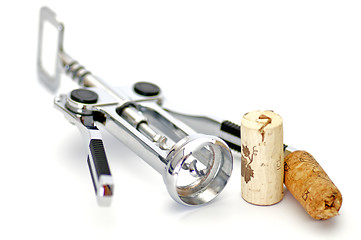 Image showing Corkscrew and two wine corks