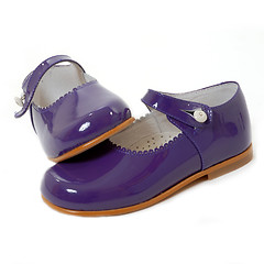 Image showing little girl violet shoes isolated 