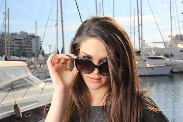 Image showing Young woman at the port