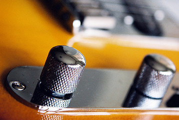 Image showing close up of guitar knobs
