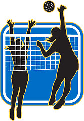 Image showing Volleyball Player Spiking Blocking Ball 