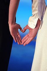 Image showing Couple With Hands Shaped like Hearts