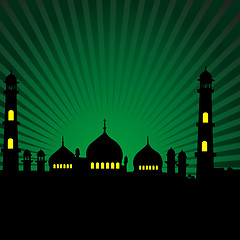 Image showing silhouette of a mosque with green rays background