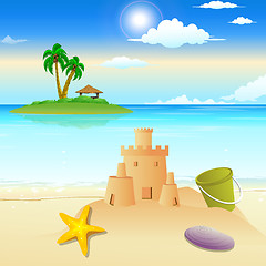 Image showing landscape view of beach, sandcastle, starfish, shells