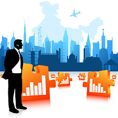 Image showing business man communicating, city background, jigsaw graph bars