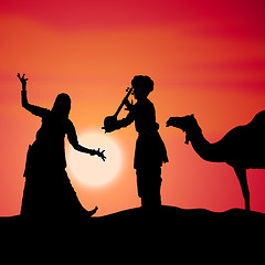 Image showing silhouette view of people performing folk dance and music, india