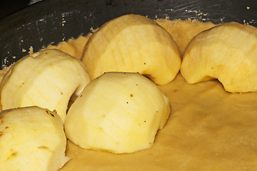 Image showing preparing apples and dough for an apple cake