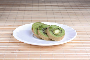 Image showing Some kiwi on the plate