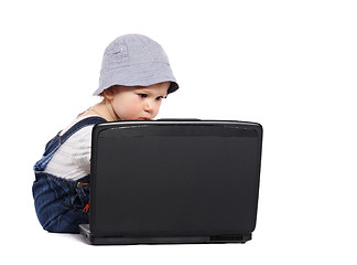 Image showing Little boy with a laptop