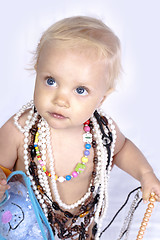 Image showing beautiful little girl with beads and neacklace