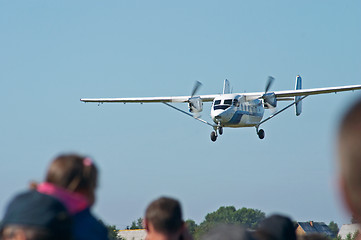 Image showing Skydivers plane landing