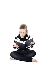 Image showing young girl reading a book