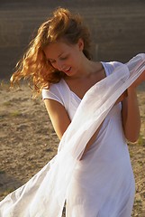 Image showing Young woman with white scarf