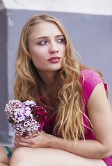 Image showing Waiting girl with bouquet