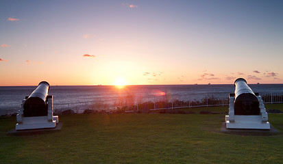 Image showing ocean sunrise and cannons at wollongong