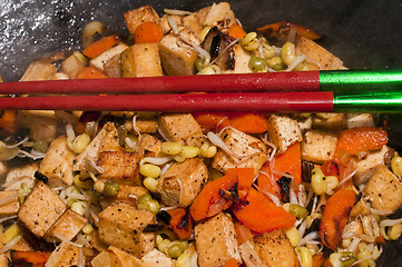 Image showing chinese wok with carrots,tofu,soybean sprouts