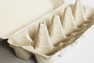 Image showing empty grey cardboard egg carton 