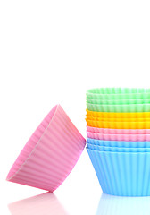 Image showing Stack of colorful cupcake liners