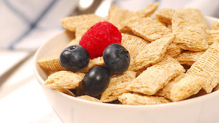 Image showing Wheat cereal with blueberries and raspberry