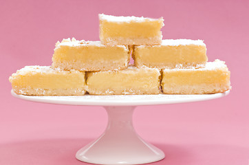 Image showing Lemon squares on a white cake stand