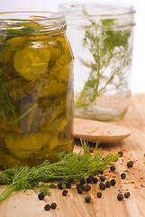 Image showing Preserving pickles with dill and peppercorns