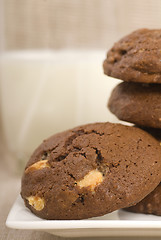Image showing Triple chocolate chip cookies with milk