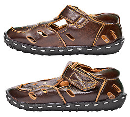 Image showing Kids brown leather sandals on white