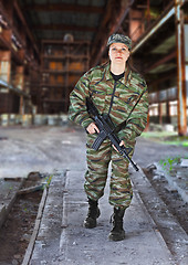Image showing A woman in military operation
