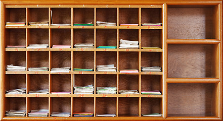 Image showing Wooden cabinet in interior of a Buddhist temple