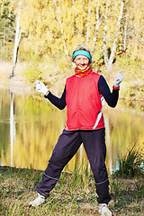 Image showing Woman making of the stretching in full nature 