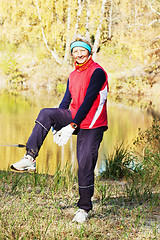 Image showing Woman making of the stretching in full nature 