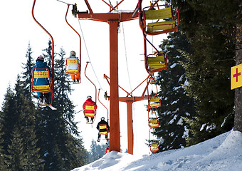 Image showing Ski lift and skiers