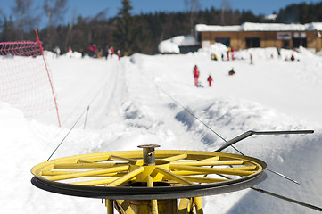 Image showing Ski lift and skiers