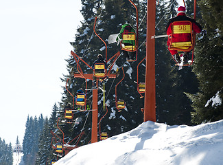 Image showing Ski lift and skiers