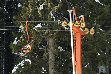 Image showing Ski lift and skiers