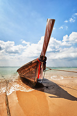 Image showing Wooden traditional boat on the beach - Thailand
