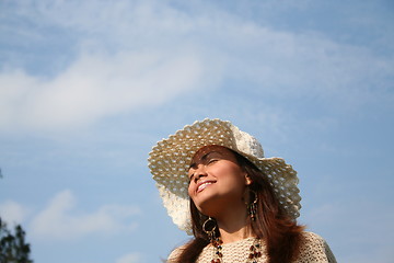 Image showing Girl turning her face to the sun