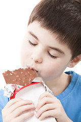 Image showing Boy with chocolate in the hands 