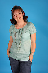 Image showing fashion woman on blue background studio shot