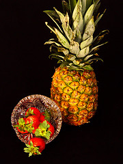 Image showing Pineapple and Strawberries on Black