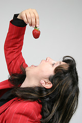 Image showing beautiful woman with beautiful red strawberries, healthy food