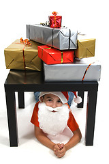 Image showing boy with large present at christmas time