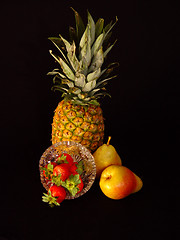 Image showing Pineapple Pears and Strawberries in Black