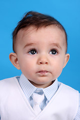 Image showing Portrait of a happy baby boy Isolated on blue background