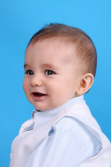 Image showing Portrait of a happy baby boy Isolated on blue background