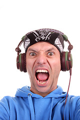 Image showing Man enjoying music, studio photo