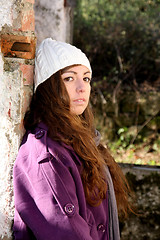 Image showing  beautiful woman in an autumn park 