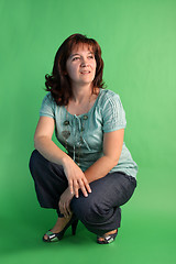 Image showing fashion woman on green background. studio shot.